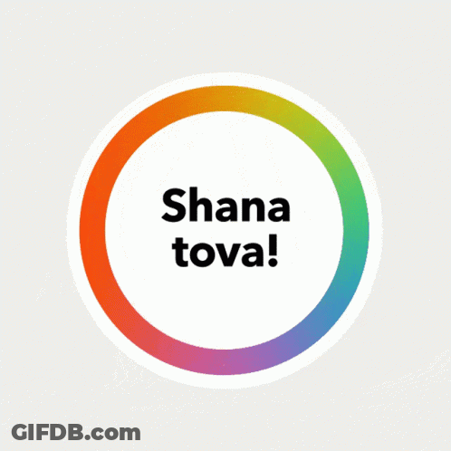 A Rainbow Apple With The Words Shana Tova Written On It GIF
