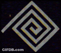 A Rainbow Colored Optical Illusion Of A Diamond On A Black Background . GIF