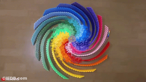 A Rainbow Colored Swirl Made Out Of Plastic Beads With A Youtube Logo In The Bottom Right Corner GIF