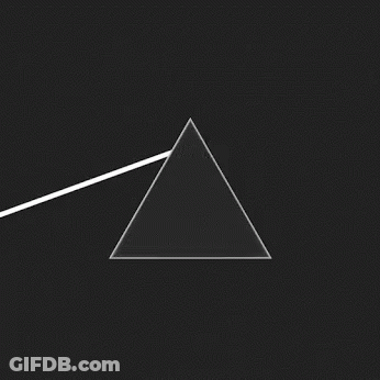A Rainbow Colored Triangle With A White Line Coming Out Of It On A Black Background GIF