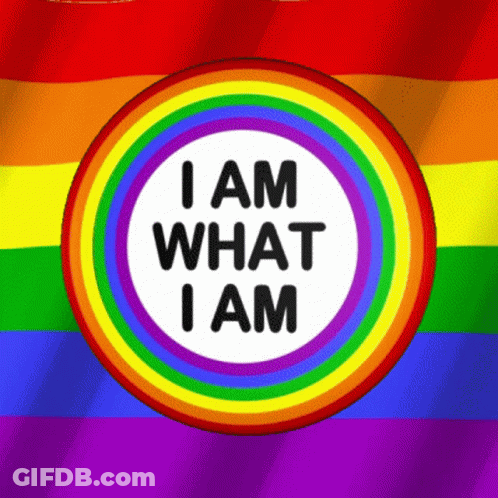 A Rainbow Flag With The Words I Am What I Am In A Circle GIF