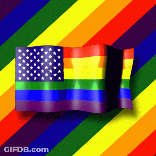 A Rainbow Flag With White Stars On It Is Waving In The Wind GIF