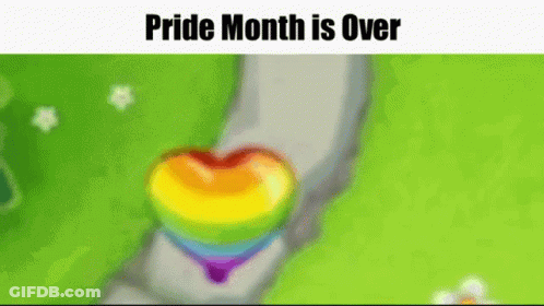 A Rainbow Heart Is Walking Down A Path With The Words Pride Month Is Over . GIF