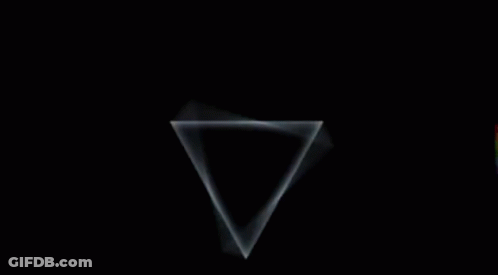 A Rainbow Is Coming Out Of A Black Hole In The Dark GIF