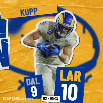 A Rams Football Player Is Running With The Ball GIF