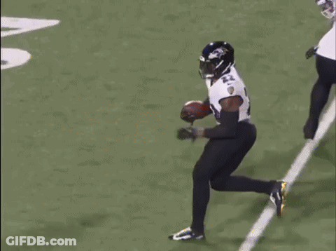 A Ravens Hat Is Sitting In Front Of A Large Explosion GIF