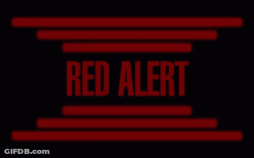 A Red Alert Sign Is Displayed On A Black Background With Red Lines . GIF