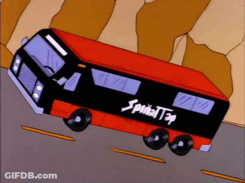 A Red And Black Bus With The Word Spiral Tap On The Side GIF