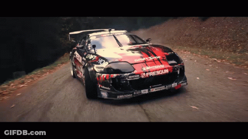 A Red And Black Car With Drift Shop Written On It GIF