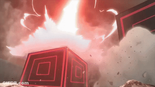 A Red And Black Cube Is Exploding In The Air GIF