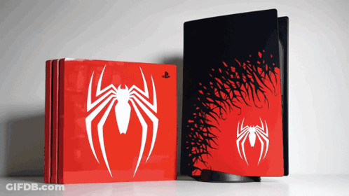 A Red And Black Playstation With A Spider On The Front GIF