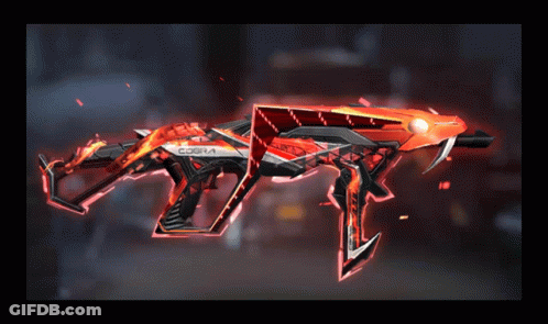 A Red And Black Weapon With The Word Cobra On The Side GIF