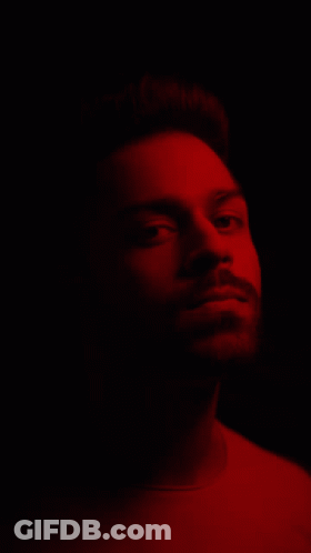A Red And Blue Background With A Green Line GIF