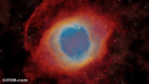 A Red And Blue Galaxy With A Blue Center GIF