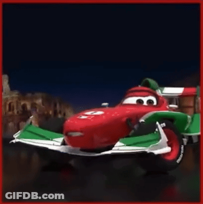 A Red And Green Racing Car With The Number 6 On The Side GIF