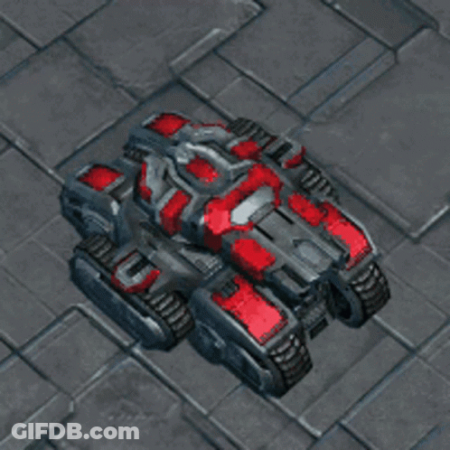 A Red And Silver Robot Is Sitting On A Tiled Floor GIF