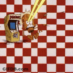 A Red And White Checkered Table Cloth With A Cartoon Character In Front Of An Arcade Game That Says Popgames GIF