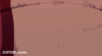 A Red And White Dragon Is Flying Through The Air In A Dark Room . GIF