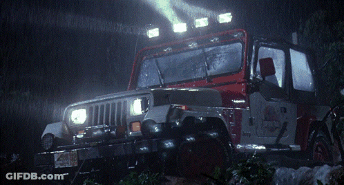 A Red And White Jeep With A License Plate That Says ' Jeep ' GIF
