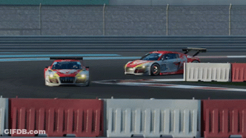 A Red And White Race Car With The Number 7 On It GIF