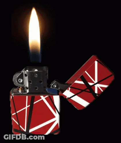 A Red And White Zippo Lighter With A Flame Coming Out Of It GIF