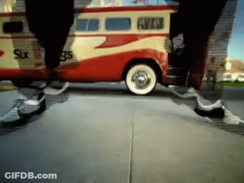 A Red And Yellow Van That Says Six 95 On It GIF