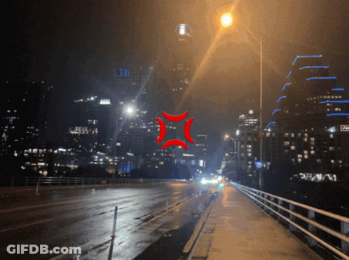 Red Angry Face On Night Street GIF