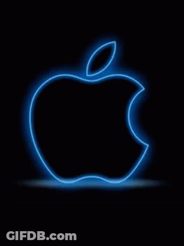 A Red Apple Logo Is Glowing On A Black Background . GIF