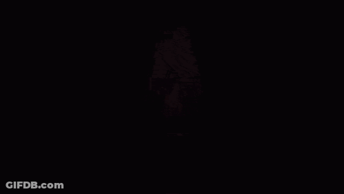 A Red Background With A Light Coming Out Of The Corner GIF
