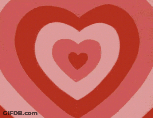 A Red Background With Three Pink Hearts On It GIF