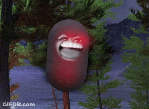 A Red Balloon With A Face On It Is Hanging From A Tree GIF