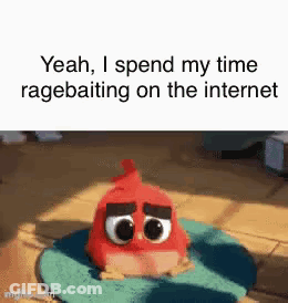 A Red Bird From The Angry Birds Movie Is Sitting On A Blue Mat . GIF