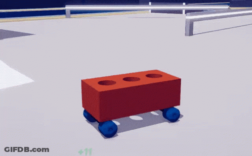 A Red Brick With Three Holes In It Is Laying On A White Surface GIF