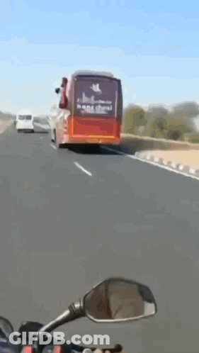 A Red Bus With The Word Han School On The Back Of It GIF