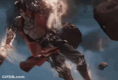 A Red Cape Is Flying Through The Air With A Light Coming From It GIF