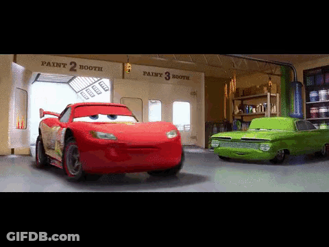 A Red Car And A Green Car In A Garage With Paint Booth Written On The Wall GIF