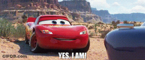 A Red Car From The Movie Cars Is Driving Down A Dirt Road And Says `` Yes , I Am '' . GIF