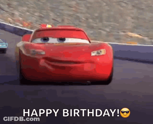 A Red Car From The Movie Cars Is Driving Down A Race Track And Says Happy Birthday . GIF