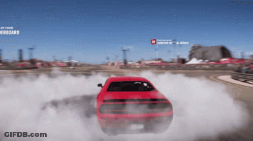 A Red Car Is Drifting In A Video Game With The Word Fame On The Bottom GIF