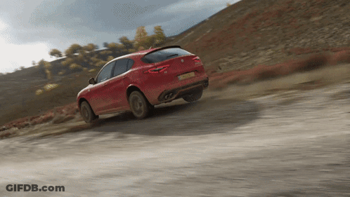 A Red Car Is Driving Down A Dirt Road And Has A License Plate That Says ' Lkc ' On It GIF