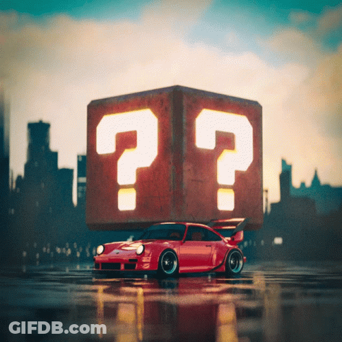 A Red Car Is Sitting On Top Of A Cube With Two Question Marks On It GIF