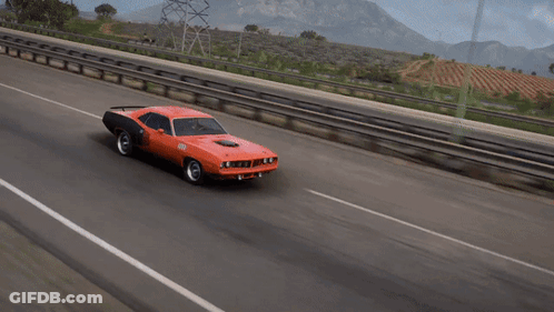 A Red Car With A Hood That Has The Letter S On It GIF