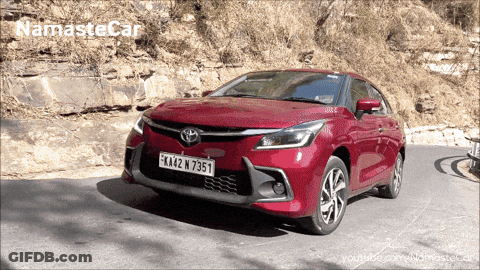 A Red Car With A License Plate That Says Fk402 N7351 GIF