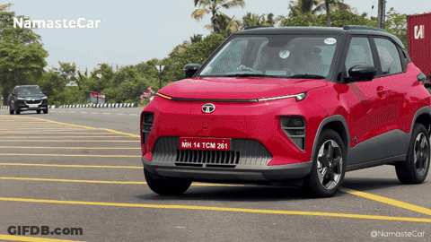 A Red Car With A License Plate That Says Mh 14 Tcm281 GIF