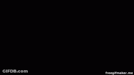 A Red Car With A Yellow Eagle On The Side Is Spinning On A Circle . GIF