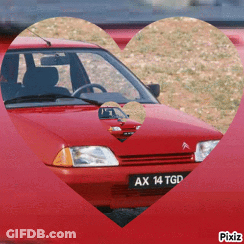 A Red Car With Ax 14 Tgd On The License Plate GIF