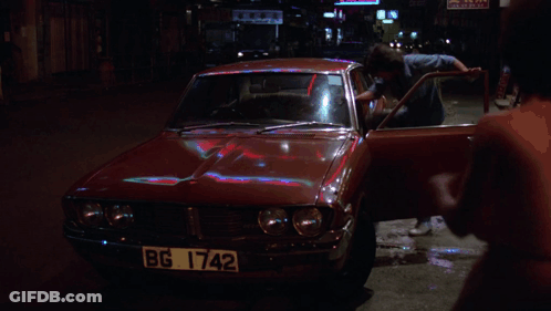 A Red Car With License Plate Bg 1742 GIF