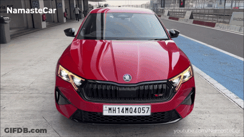 A Red Car With The License Plate Mh14m0457 GIF