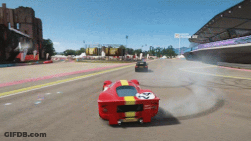 A Red Car With The Number 44 On It GIF