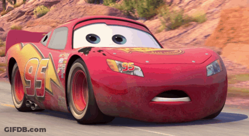 A Red Car With The Number 95 On The Front Of It GIF